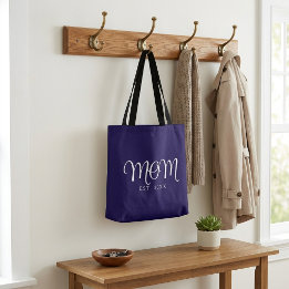 Bolsa de mano con texto blanco y año de establecim