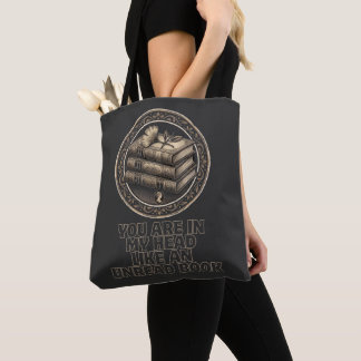 Bolsa de mano de libros antiguos y citas introspec