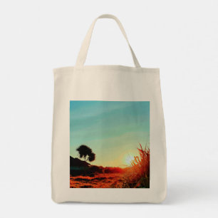 Bolsa de mano tropical de árbol de pandán al atard