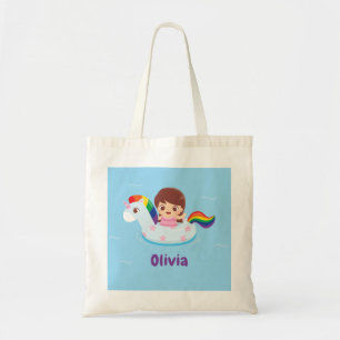 Bolsa de niña en flotador de piscina de unicornio