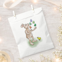 El conejo de Pascua hace malabares con los huevos