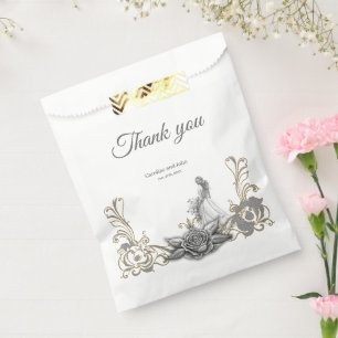 Bolsa De Papel Elegancia en plata y negro.