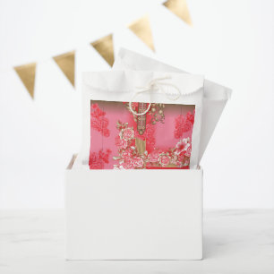 Bolsa De Papel un diseño de fondo rosa y dorado con un rojo