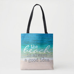 bolsa de playa mar y arena con texto