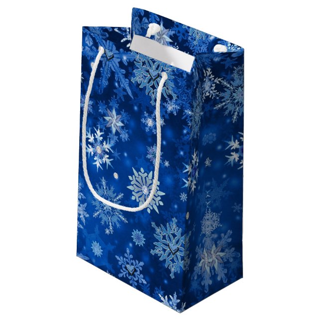 Bolsa de regalo de navidades con copos de nieve az (Angulo reverso)
