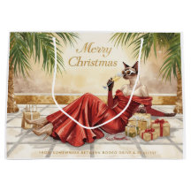 Gato siamés glamour de Navidad bebiendo champán
