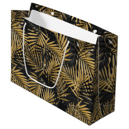 BOLSA DE REGALO GRANDE HOJAS TROPICALES NEGRAS Y DORADAS