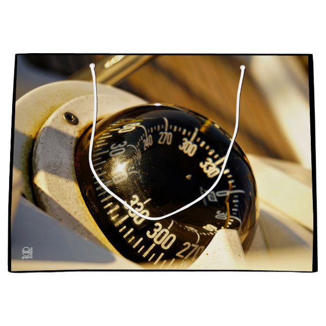 Bolsa De Regalo Grande Kompas helpt navigeren en koer behouden.  (Anverso)