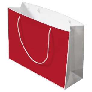 Bolsa De Regalo Grande Las prendas rojas, rosas y naranjas cuelgan juntas