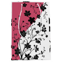 Elegante silueta floral negra sobre rosa y blanco