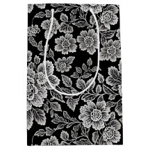 Flores blancas de encaje en negro