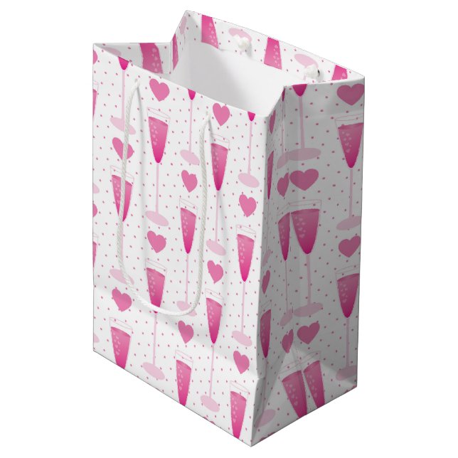 BOLSA DE REGALO MEDIANA GAFAS CUIDADOS DE CHAMPAÑA ROSA Y CORAZÓN (Angulo Anverso)
