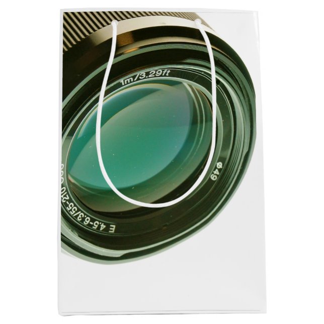 Bolsa De Regalo Mediana Lens van een fotocamera, een scherpe blik. (Anverso)