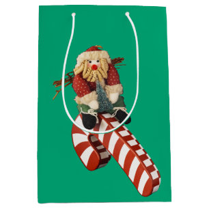 Bolsa De Regalo Mediana Papá Noel juega en un tobogán de bastones de caram