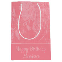 Rosa bonito sobre fondo floral rosa