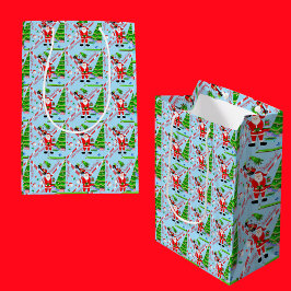 Bolsa De Regalo Mediana Santa jugando golf junto al árbol de Navidad