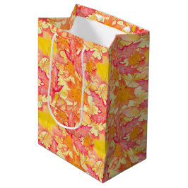 BOLSA DE REGALO MEDIANA TONOS DE NARANJA Y AMARILLO Y HOJAS CAÍDAS ROJAS
