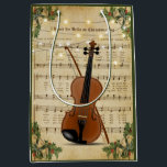 Bolsa De Regalo Mediana Vintage Christmas Sheet Music and Violin<br><div class="desc">Este hermoso diseño de bolsos de regalo para Navidades de ballet presenta un diseño de partituras de Navidad con luces de cuerda y un violín.</div>