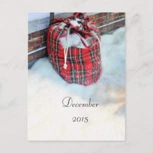 Bolsa de Santa Claus en la nieve, tarjeta de dicie