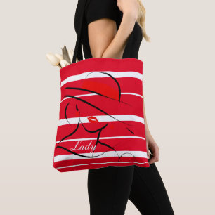 bolsa de tetas con rayas y diseño de dama.