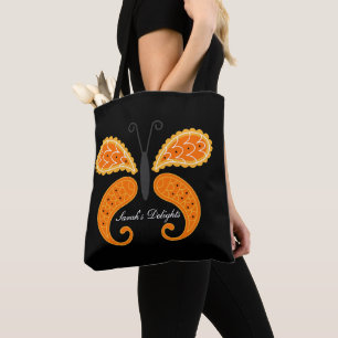 Bolsa de tetas negra con mariposa.