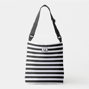 Bolsa de tocador de monograma rayado en blanco y n