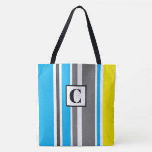 Bolsa de tocador monogramada a rayas