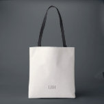 Bolsa de Tote de la dama de honor de un monograma<br><div class="desc">Un regalo que llevarán por todas partes —literalmente. Esta bolsa de marfil con un monograma gris limpio es lo suficientemente espaciosa como para que los bodas tengan lo necesario y moda suficiente para los recados cotidianos. Un regalo personalizado para la dama de honor que es tan práctico como hermoso.</div>