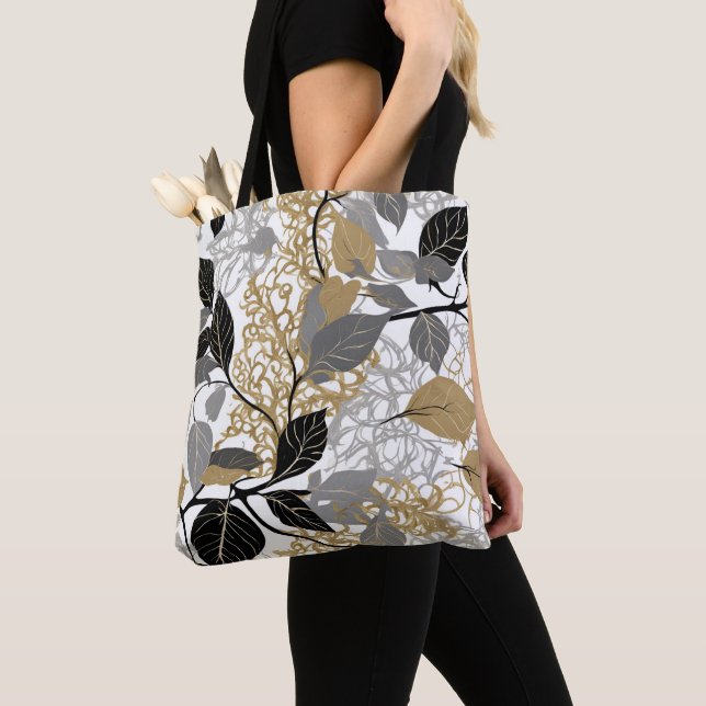 Bolsa elegante de tocador de oro y hoja negra (Detalle)