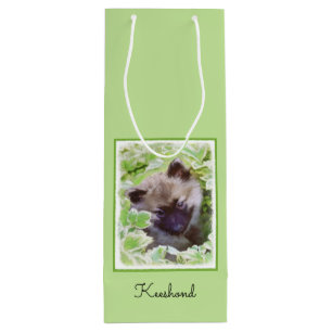 Bolsa Para Vino Keeshond Puppy en el jardín pintando arte original