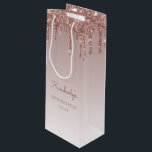 Bolsa Para Vino Purpurina Drip 50th Birthday Rosa Gold<br><div class="desc">Esta bolsa de regalo de moda para 50 años tiene un borde de goteo de purpurina rosa espumoso de oro falso y un fondo oscuro rosa de oro. Personalízalo con su nombre en escritura a mano,  junto con su cumpleaños y fecha a continuación.</div>