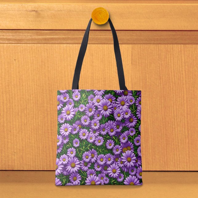 Bolsa tote de margaritas moradas (Tote bag with purple daisies.)