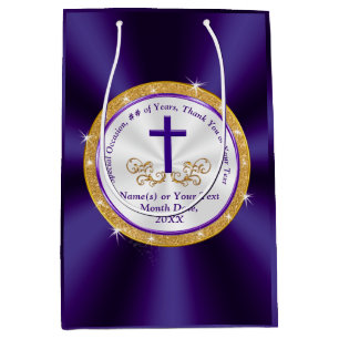 Bolsas de regalo moradas, doradas y blancas