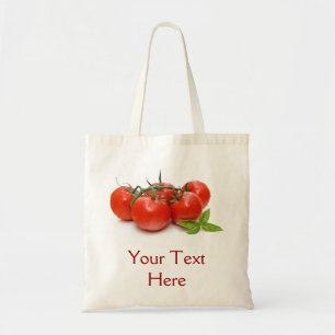 Bolso con los tomates y la albahaca