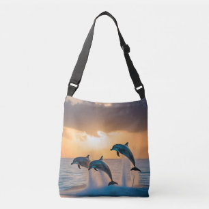 Bolso Cruzado Bailando en el crepúsculo: tres delfines saltando