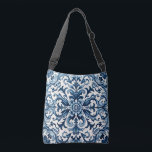 Bolso Cruzado Baldosa azul portuguesa<br><div class="desc">Este producto tiene un diseño intrincado con un fondo azul oscuro y patrones ornamentales blancos. El diseño recuerda a los estilos tradicionales de cerámica o porcelana,  que pueden interesar a los amantes de la estética clásica o vintage.</div>