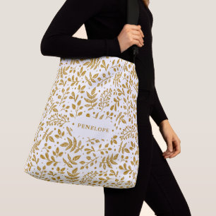 Bolso Cruzado Botánica de color blanco y dorado con nombre