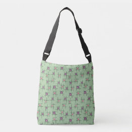 Bolso Cruzado Flores y palos geométricos sobre fondo verde