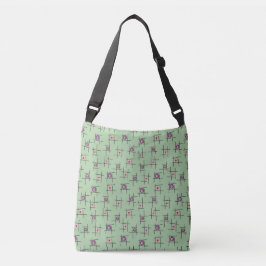Bolso Cruzado Flores y palos geométricos sobre fondo verde