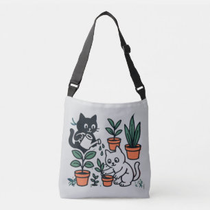 Bolso Cruzado Gatos negros y blancos cuidando plantas de jardín