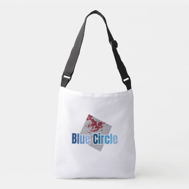 Bolso Cruzado Grey Square with Red Stain and Blue Circle Text (Anverso)