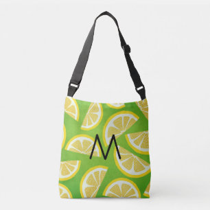 Bolso Cruzado Lemones personalizados en un fondo verde limón