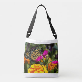 Bolso Cruzado Mariposa monarca en la flor rosada de Marigold