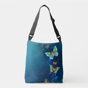 Bolso Cruzado Mariposas doradas sobre fondo azul