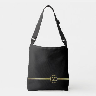 Bolso Cruzado Monograma dorado elegante sobre negro