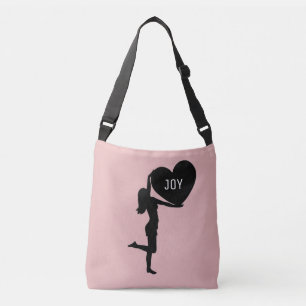 Bolso Cruzado Mujer con corazón silueta negra en oro rosa
