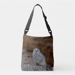 Bolso Cruzado Nieve sobre una roca