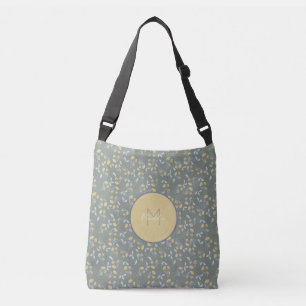 Bolso Cruzado Patrón floral amarillo con monograma