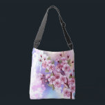 Bolso Cruzado Sakura rosa sobre fondo de pintura<br><div class="desc">Dibujado artísticamente,  rama de rosa,  flores de cerezo sobre fondo pintoresco,  texturizado,  pintado con pintura blanca,  rosa y azul. Pink Sakura</div>