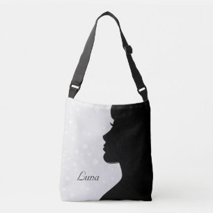 Bolso Cruzado Silueta de mujer moderna sobre gris claro